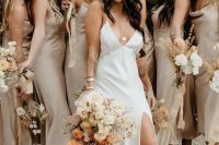 lovely grey slip midi bridesmaid dresses with cowl necks and black heels for a cool spring or fall wedding