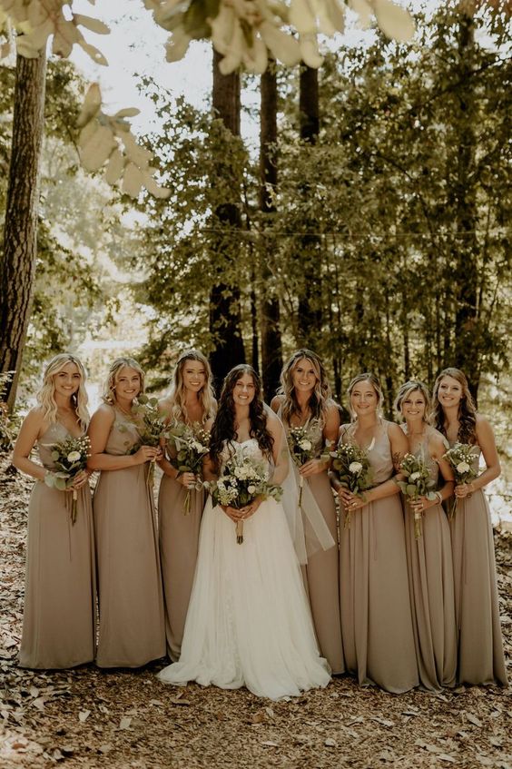 matching greige maxi bridesmaid dresses with pleated skirts are a gorgeous idea for a refined wedding in spring or summer