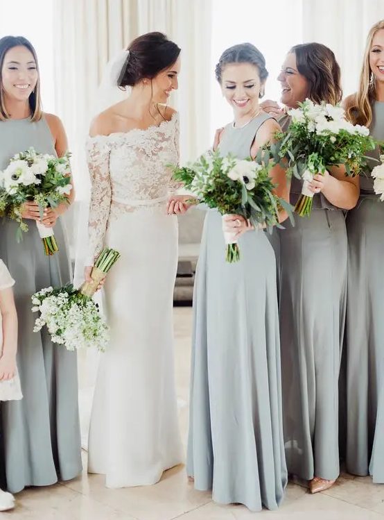 minimalist grey A-line maxi bridesmaid dresses with no sleeves and high necklines plus pleated skirts are super cool