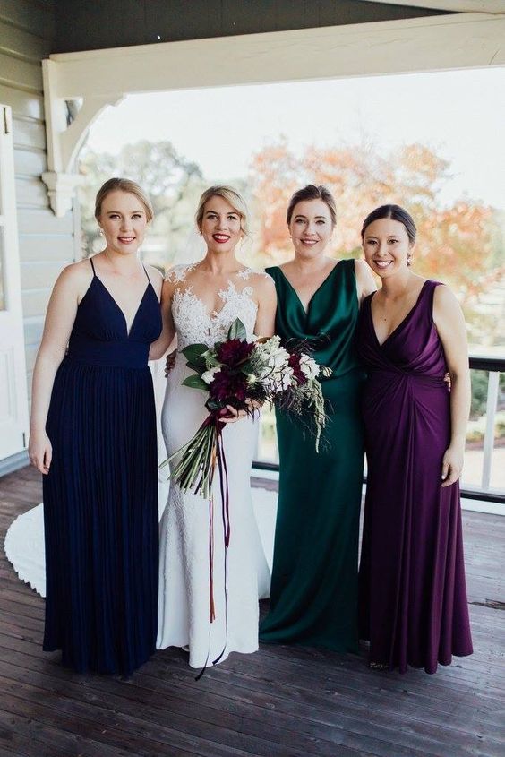 mismatched maxi bridesmaid dresses in purple, dark green and midnight blue are a very elegant choice for a fall wedding