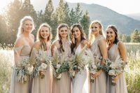 mismatching dove grey maxi bridesmaid dresses are a veyr chic and refined idea for a spring or summer wedding with a boho feel