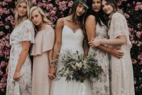 mismatching neutral maxi and midi bridesmaid dresses united with floral patterns are great for a flower-filled wedding