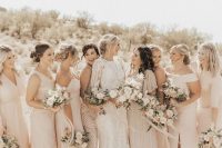 mismatching neutral maxi bridesmaid dresses in creamy, blush, light pink and tan, with embellishments and draperies are amazing
