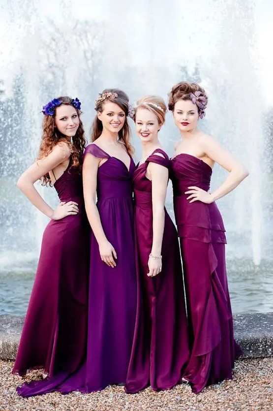 purple and fuchsia mismatched maxi bridesmaid dresses with various necklines are gorgeous for a berry hued wedding