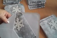 silver grey winter wedding invites with snowflakes and in grey envelopes for a trendy look