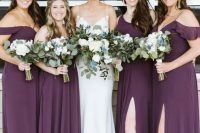 stylish deep purple maxi bridesmaid dresses with mismatching necklines and slits plus nude shoes are a gorgeous combo for a wedding