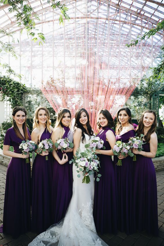 super bold eggplant maxi bridesmaid dresses with mismatching necklines look very chic, cool and ultra modern