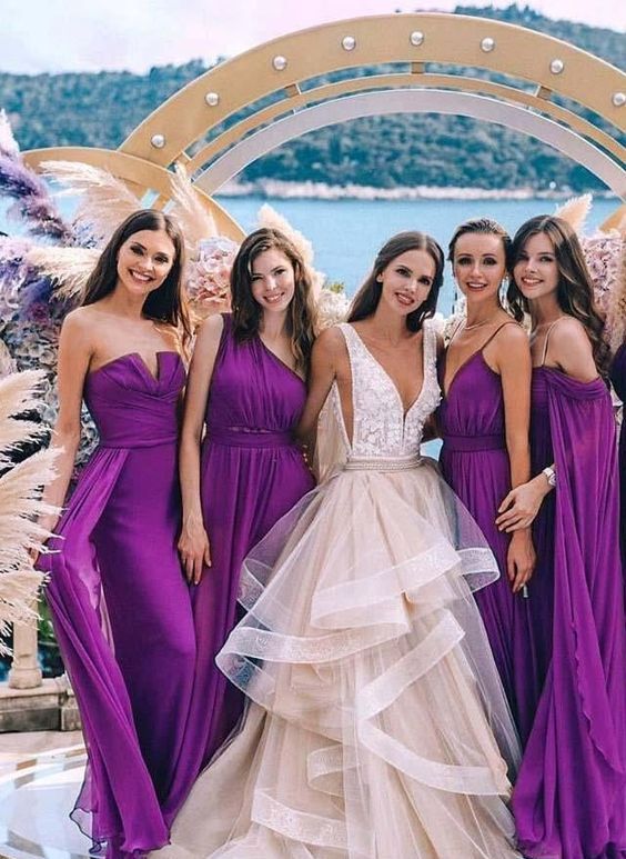super bright purple maxi bridesmaid dresses with one shoulder and strapless necklines are amazing for summer weddings
