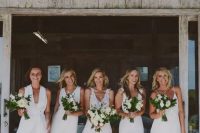 white bridesmaids’ dresses – a high low with spaghetti straps, midi and mini with thick straps and a front slit one with thick straps