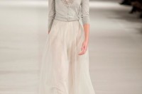 a grey cut out embellished cardigan and a neutral skirt for a chic and refined bridal outfit