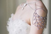 elegant shoulder jewelry plus a necklace with statement rhinestones in one for accenting a bridal look with a strapless wedding dress