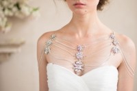 a catchy thread shoulder jewelry piece with statement floral embellishments is a very refined and chic idea