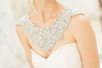 a statement rhinestone and beads collar and shoulder jewelry piece is a stylish glam idea with a vintage feel