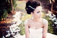 refined shoulder jewelry plus a matching headpiece and statement earrings make a romantic and chic look
