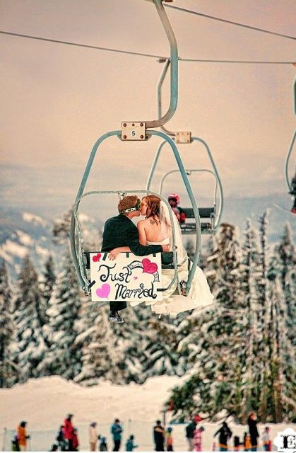 take a pic with a ski lift and Just Married sign instead of a usual car - this is a cool getaway for a ski resort wedding