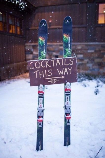 colorful skis with a sign are nice to decorate your wedding venue - use them to do that