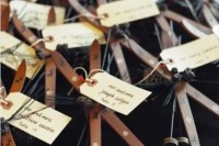 skis and ski poles plus tags as seating cards double as wedding favors at a ski resort wedding