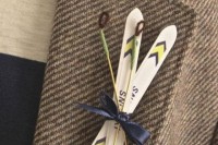 a ski boutonniere is a pretty and chic idea for a groom who wants a ski resort wedding