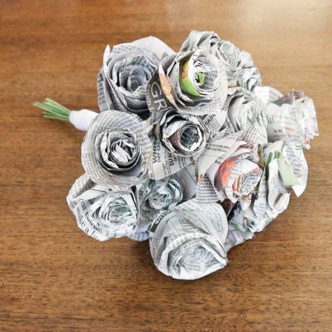 a wedding bouquet made of newspaper flowers is a very cool and fresh solution for a wedding, it's a sustainable and eco-freidnyl option