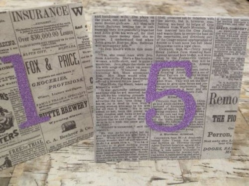 newspaper table numbers cna be easily DIYed and look pretty nice at a vintage wedding