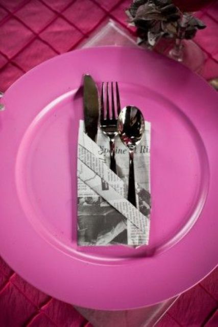 a newspaper cutlery pocket is a creative idea for a modern wedding