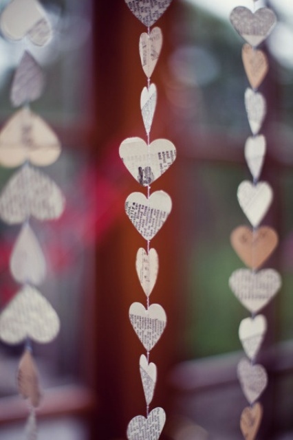 newspaper heart garlands can be hung vertically or horizontally throughout your wedding venue