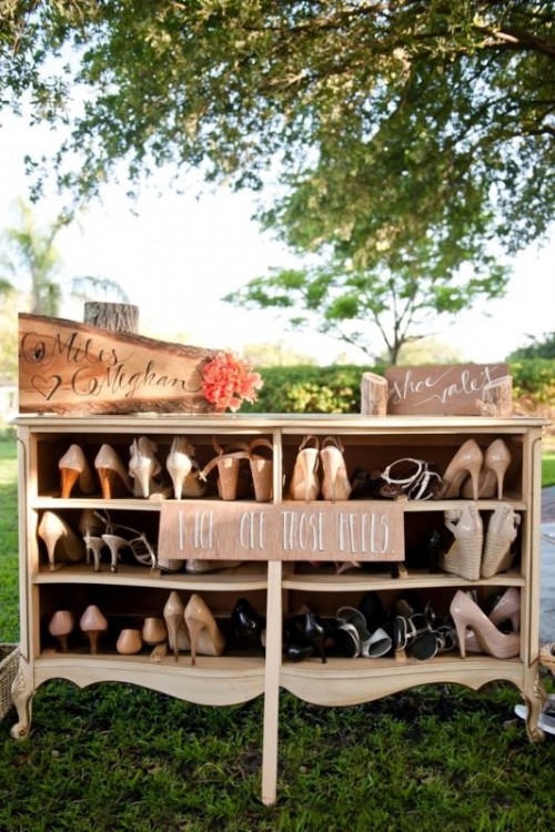 if you are having a beach or meadow wedding with tall grass, offer your guests a place to take off their shoes, make it of a vintage dresser