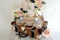 a unique wedding cake featuring layers looking like vintage suitcases or boxes and sugar blooms screams travelling