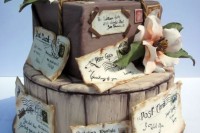 a wedding cake imitating a pack on a tree stump and lots of postcards and letters sent to you