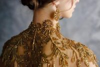 a gold beads and rhinestones shoulder cover with a high collar is a jaw-dropping piece to try