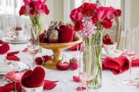 a gorgeous Valentine engagement tablescape with plush red hearts, pink and blooms blooms and vintage porcelain
