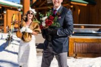 a just married couple going to snowboard together is a great idea for a bold snowboard-loving wedding