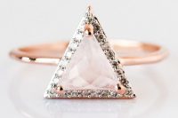 a stunning rose gold ring with a triangle-shaped rose quartz and diamonds is lovely and wow
