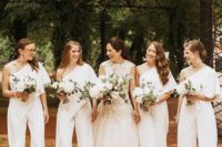 chic one shoulder bridesmaid jumpsuits with draped bodices and wideleg pants plus statement earrings for a modern wedding