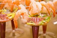 delicious Valentine appetizers of shrimps, herbs and sauce are exquisite and look gorgeous