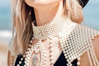 luxurous pearl shoulder jewelry with a collar and statement pendants for a bride who loves traditional but done fresh and new