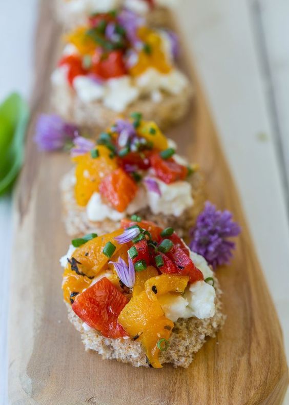 mini tarts with cream cheese, fresh veggie salad and herbs and blooms are romantic and cute Valentine wedding appetizers