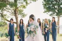 mismatching blue bridesmaid jumpsuits with various necklines to add color and chic to your bridal party