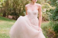 a strapless embellished rose quartz A-line wedding dress will create a romantic look of a modern princess