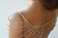 rhinestone threads as dramatic shoulder jewelry to add a shiny glam touch to the look