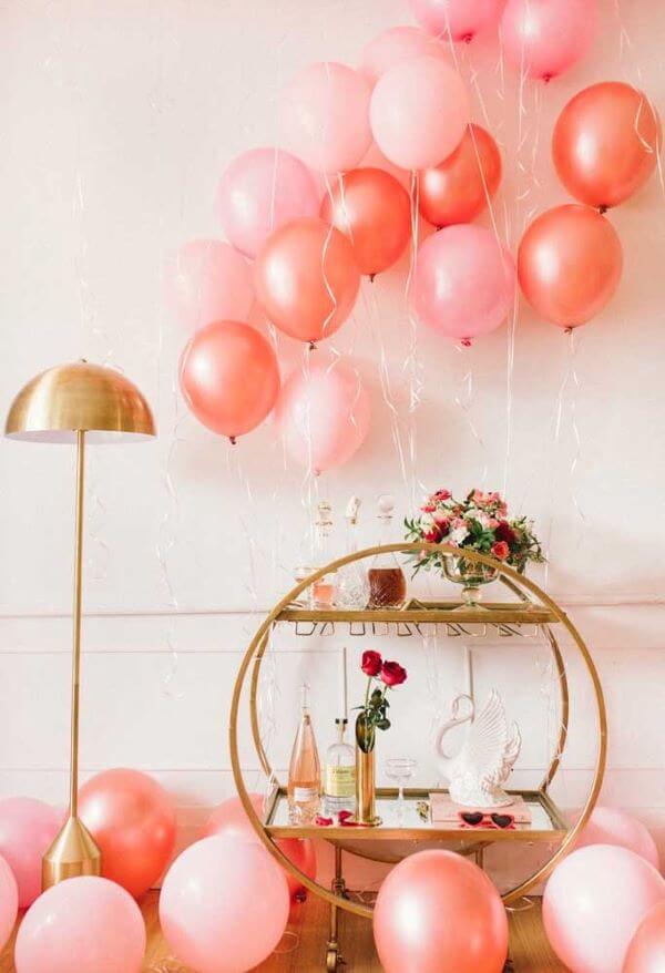 style your home with pink and peachy balloons, decorate your bar with blooms and offer your favorite drinks for Valentine's Day