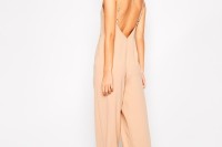 a blush jumpsuit with spaghetti straps, wideleg pants and a cutout back plus matching heels for a summer wedding