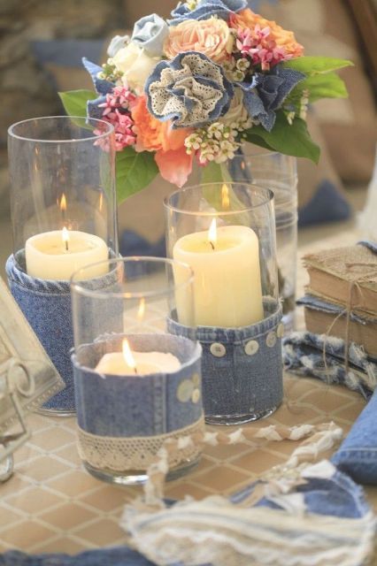 candles wrapped with denim and blooms with denim flowers in them for cool rustic and cowboy-themed decor