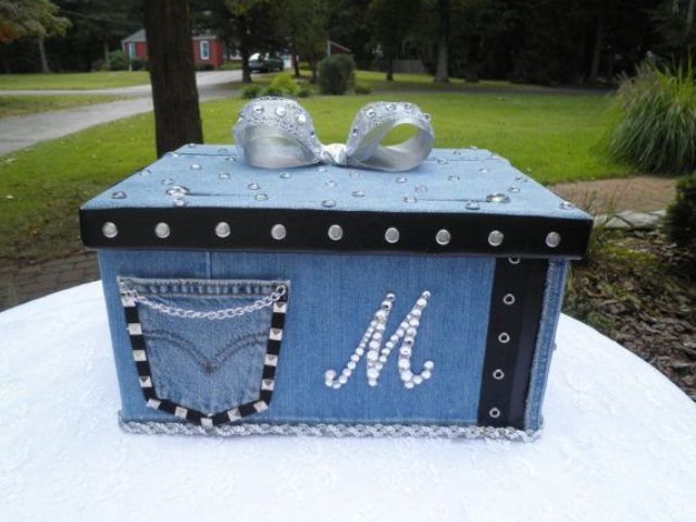a denim box with a pocket and a monogram plus a glam bow on top for cards and wishes