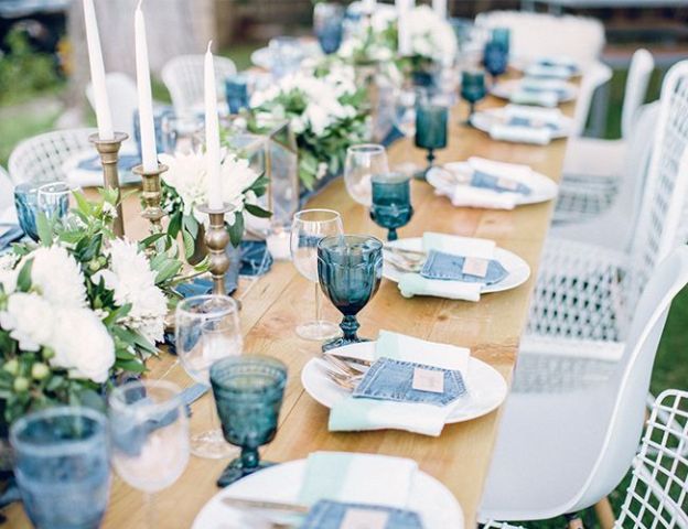 denim cutlery pockets, blue glasses, a blue runner is a cool idea for sprucing up the table