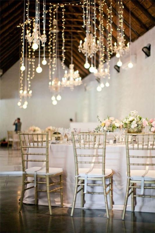 bulbs can hang down together with fairy lights to give more light to your wedding reception space