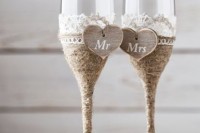 vintage rustic wedding flutes wrapped with twine and lace plus wooden hearts is a very creative idea to try