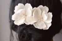 faux magnolia blooms with beads will accent your hairstyle in the best way possible