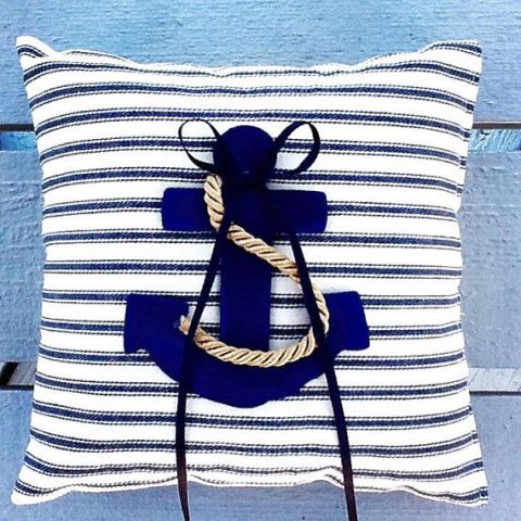 a striped pillow with a navy anchor and rope is a lovely ring pillow for a wedding or can be used just as decor