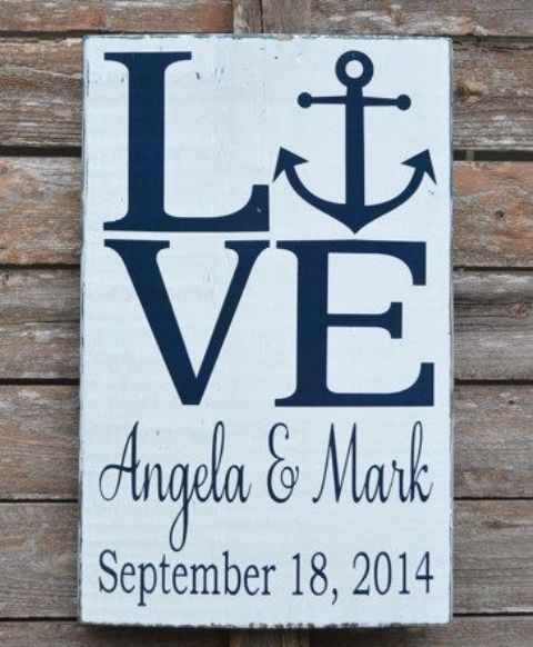 a LOVE wedding sign with an anchor is a cool decoration for a nautical wedding, it's bold and contrasting